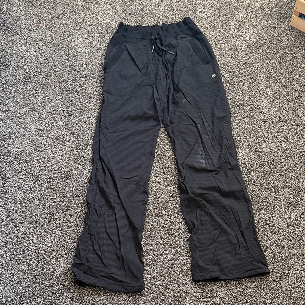 worn LULULEMON dance studio pants